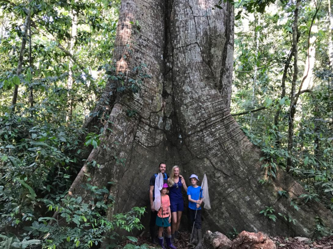 Conservation volunteers in Peru take a break to take a family photo. On a family volunteering opportunity abroad, a family take a photo during their Peru Conservation Project.